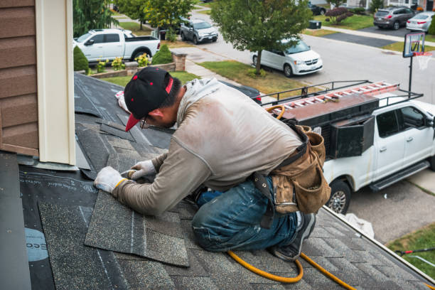 Professional Flat Roof Repair technician working in Chelsea, IA
